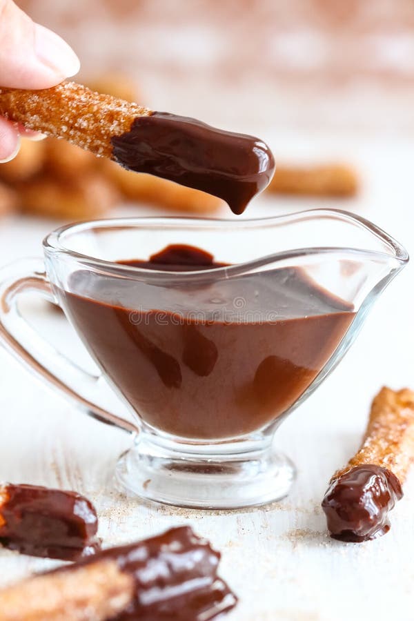 Churros with Chocolate royalty free stock images