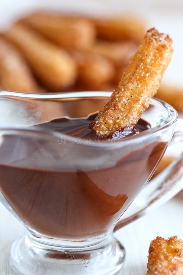 Churros with Chocolate royalty free stock images