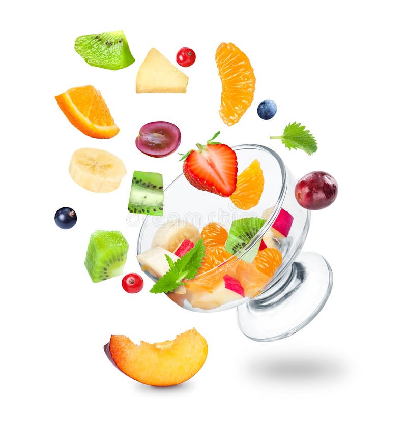 Delicious fresh fruit salad falling on a white background. Delicious fresh fruit salad falling on a white background