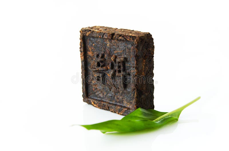 Chá pressionado, chá de Plutônio-erh do hieroglyph imagem de stock Chá pressionado, chá de Plutônio-erh do hieroglyph imagem de stock