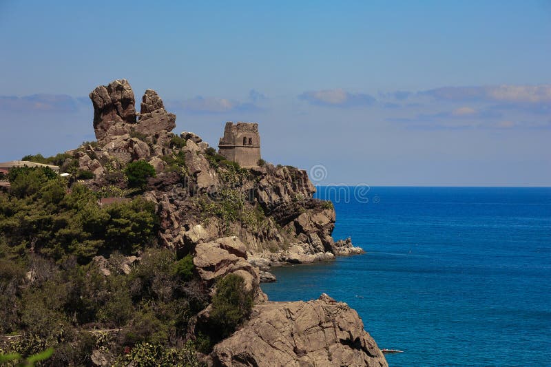 Cefalu Castle ruins or Rocca della Cefalu, near Palermo in Sicily.  Panoramic coastline views, castle ruins on a rocky cliff, with deep blue Tyrrenhian sea background. Cefalu Castle ruins or Rocca della Cefalu, near Palermo in Sicily.  Panoramic coastline views, castle ruins on a rocky cliff, with deep blue Tyrrenhian sea background