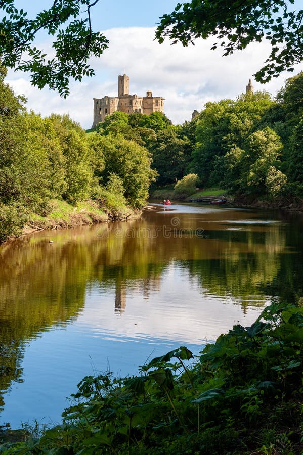 Warkworth Castle reflected in the River Coquet, Morpeth, Northumberland, UK. Warkworth Castle reflected in the River Coquet, Morpeth, Northumberland, UK.