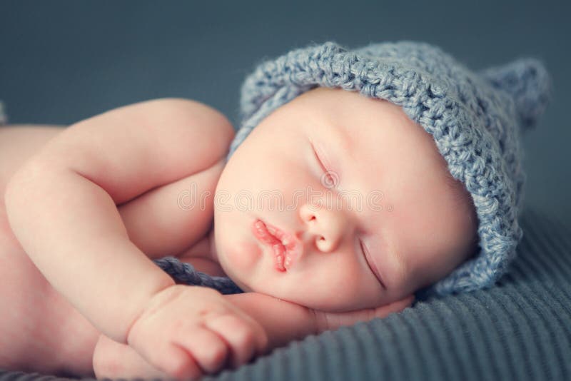 Sleeping newborn baby on a blanket. Sleeping newborn baby on a blanket