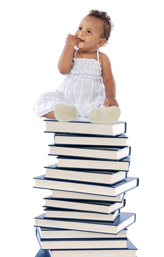 Chéri sur une tour de livre photo stock Chéri sur une tour de livre photo stock