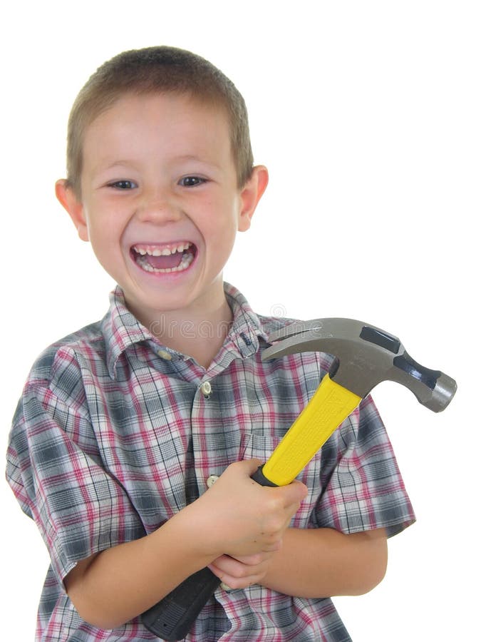 Boy holding a hammer. Boy holding a hammer