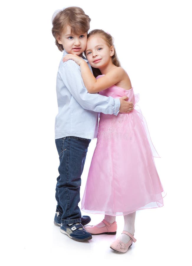 Little boy and girl in love. Isolated on white background. Little boy and girl in love. Isolated on white background