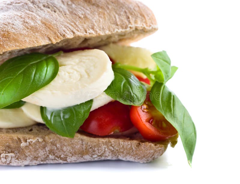 Ciabatta with Mozzarella, Tomato and Basil on White Stock Photo Image