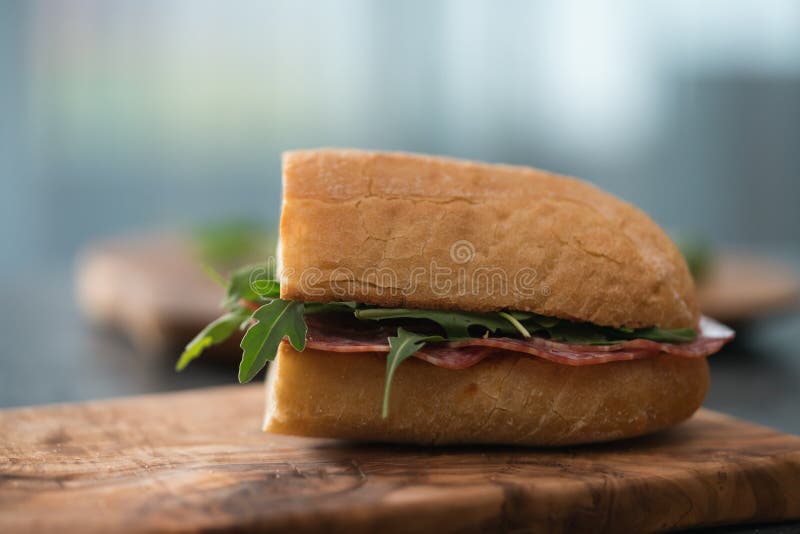 Ciabatta Sandwich with Salame, Arugula, Red Pesto and Cream Cheese on ...