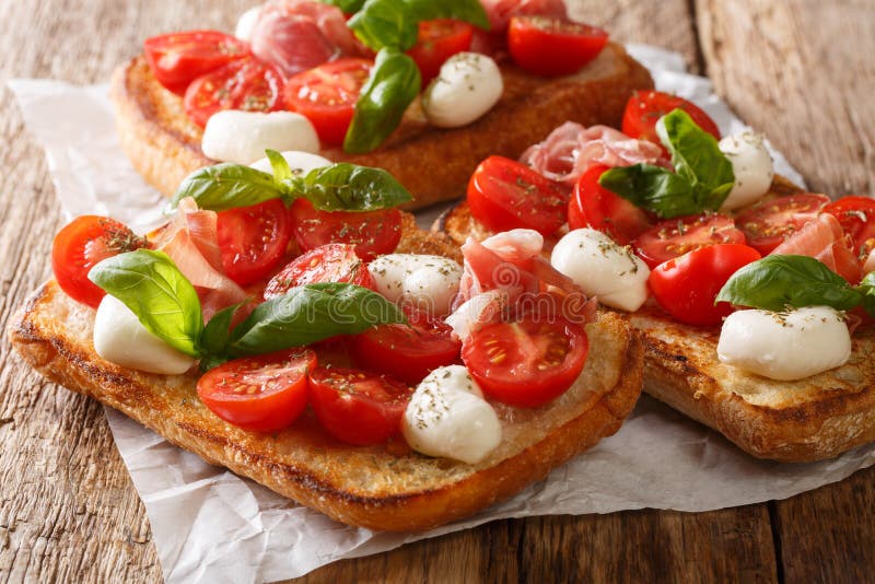 Ciabatta Sandwiches with Mozzarella, Tomatoes, Ham and Basil Close-up ...