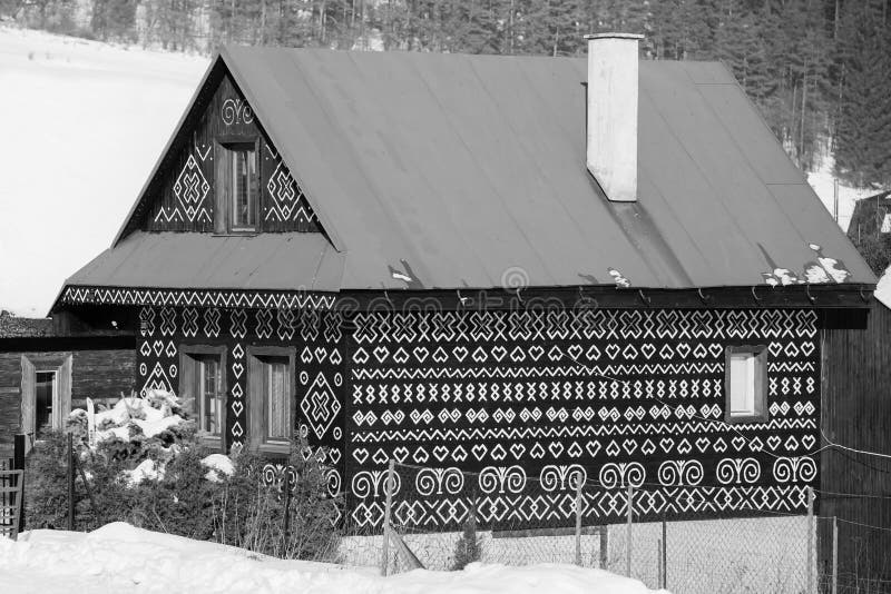 Cicmany, Slovakia. Old wooden houses in Slovakia village Cicmany in winter. The ornaments from Cicmany, and the Slovak folk patter