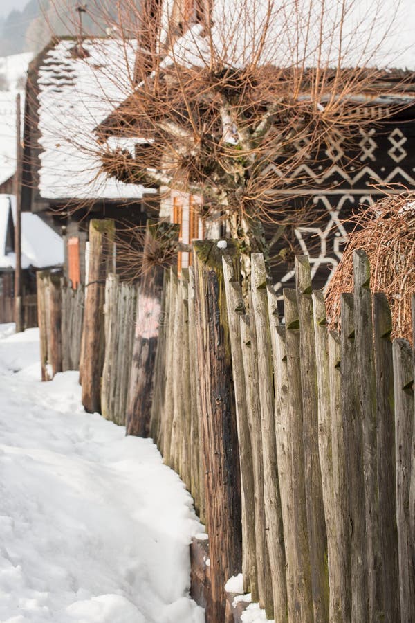 Cicmany, Slovakia. Old wooden houses in Slovakia village Cicmany in winter. The ornaments from Cicmany, and the Slovak folk patter