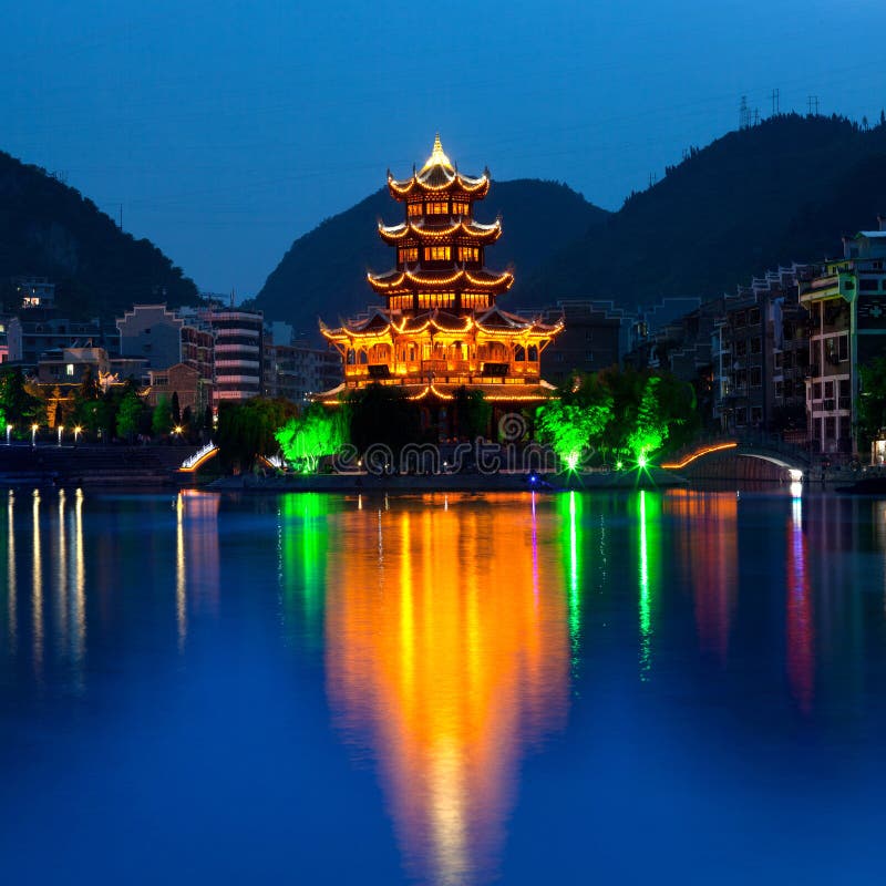 Zhenyuan Ancient Town, China - night scene. Located on eastern part of Guizhou Province, Zhenyuan has long been an ancient town of the Miao people. Zhenyuan Ancient Town, China - night scene. Located on eastern part of Guizhou Province, Zhenyuan has long been an ancient town of the Miao people.