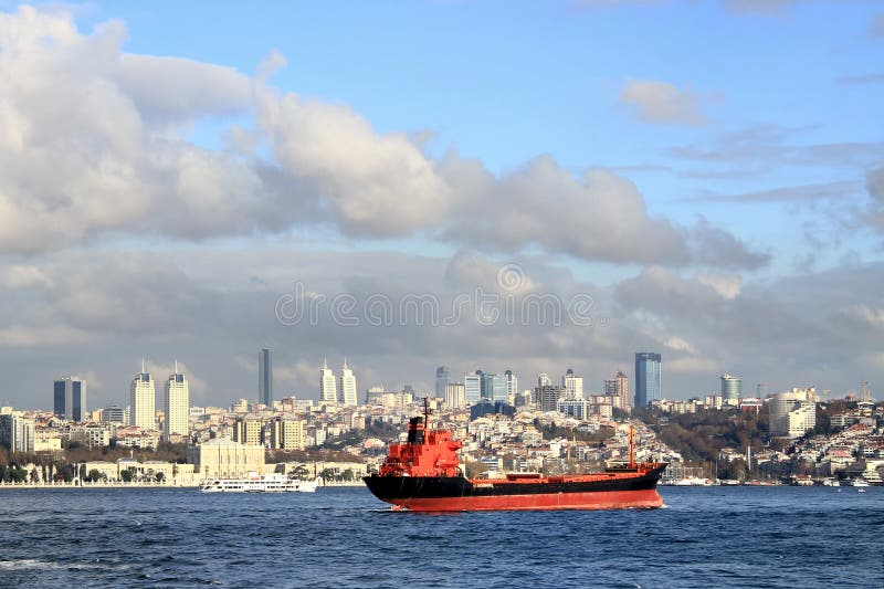 Red cargo ship in Bosporus, Istanbul. Red cargo ship in Bosporus, Istanbul