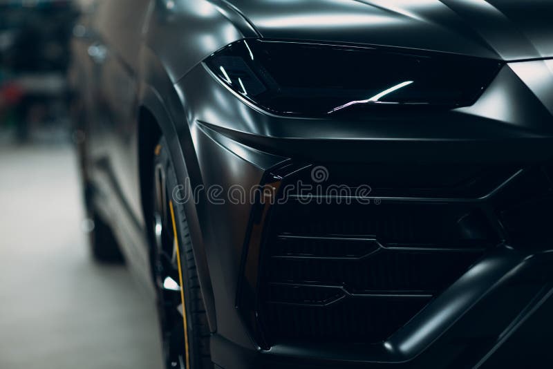 Lamborghini Urus black color sports car close up. Lamborghini Urus black color sports car close up
