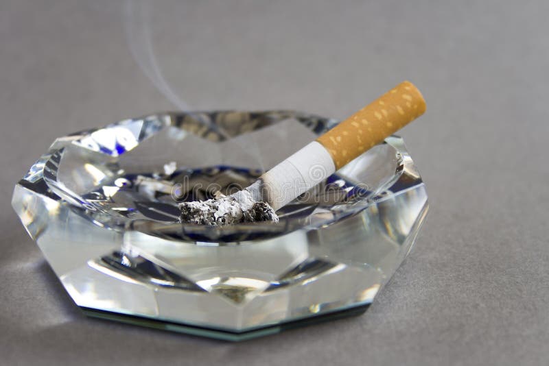 Cigarette and ashtray stock image. Image of lifestyles 2306893