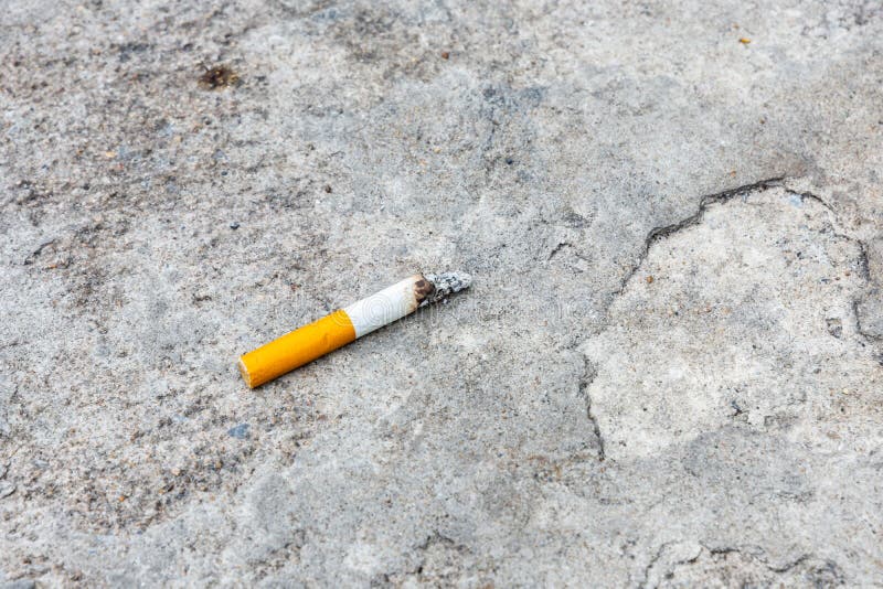 Cigarette on the concrete stock photo. Image of background 200582540