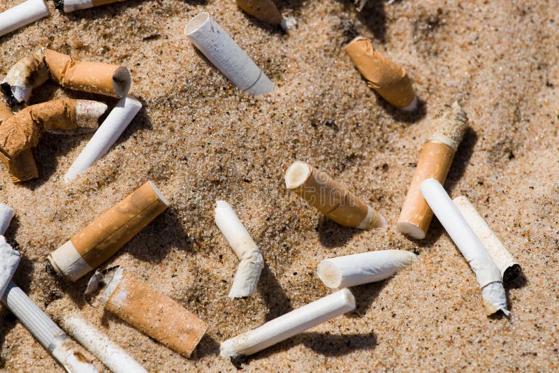 Cigarette in sand stock photo. Image of pollute, ground 5508308