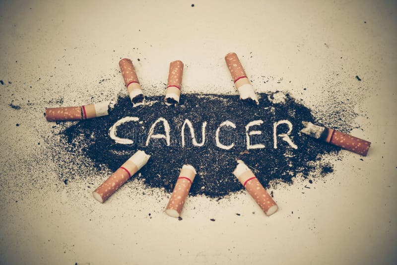 Cigarette cause cancer stock image. Image of crushing 76305427