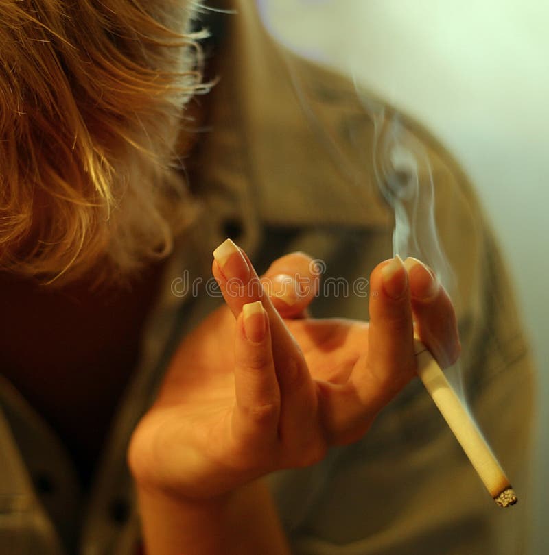 Cigarette in a female hand