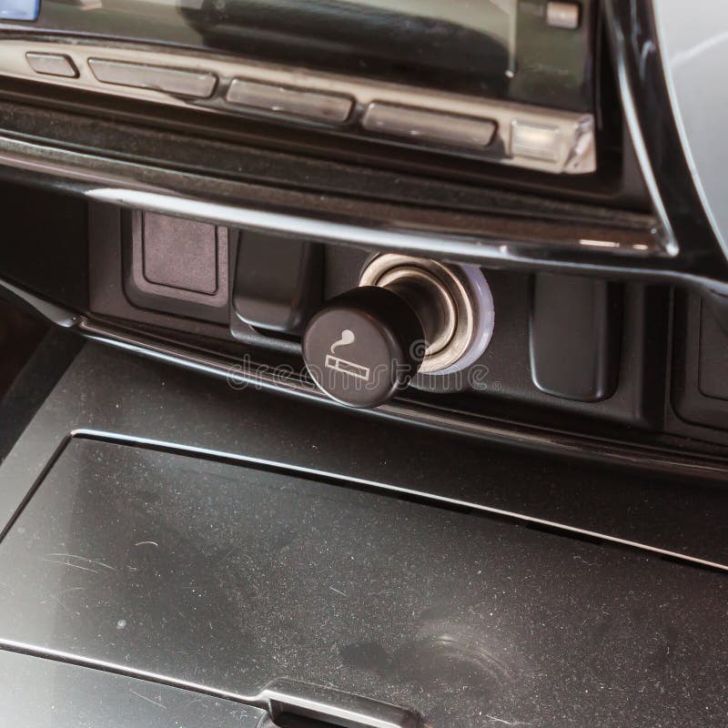 The cigarette lighter in the car stock photo The cigarette lighter in the car stock photo
