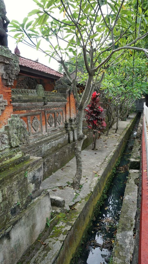 Cimahi, West Java Indonesia - August 1, 2021: Photograph of the open drainage system arround Hindu temple Pura Agung. Cimahi, West Java Indonesia - August 1, 2021: Photograph of the open drainage system arround Hindu temple Pura Agung