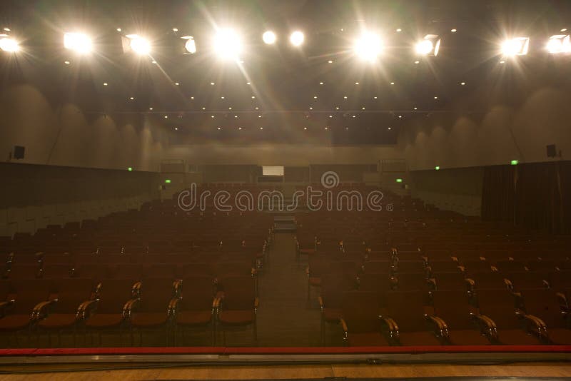 Empty cinema auditorium with spotlights. Empty cinema auditorium with spotlights