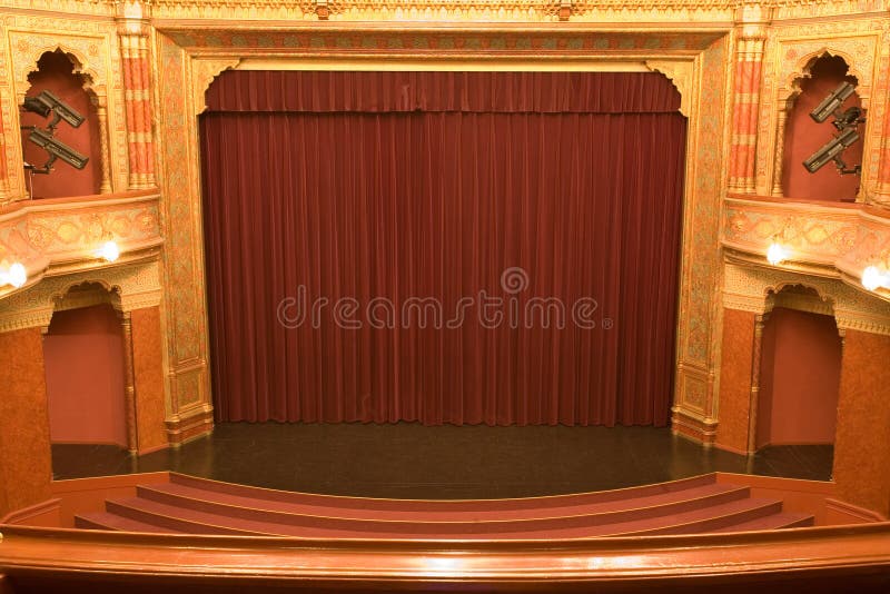 Cinema stage with red curtains