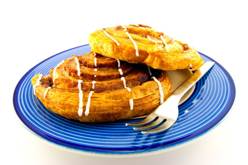 Cinnamon Buns on a Blue and White Plate