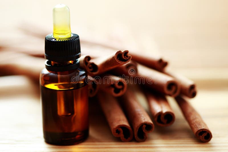 Cinnamon essential oil stock photo. Image of perfume 13578972