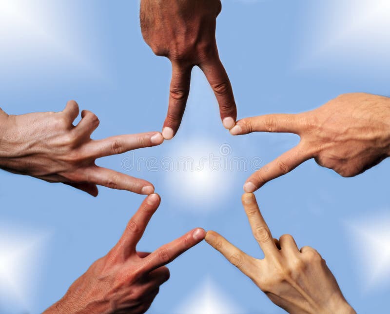 Five hands with different skin-color, their fingers building a star. Five hands with different skin-color, their fingers building a star