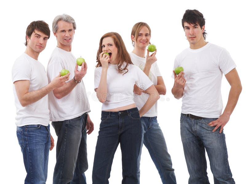 Five people in white shirts and blue jeans are presentating green apples. Five people in white shirts and blue jeans are presentating green apples