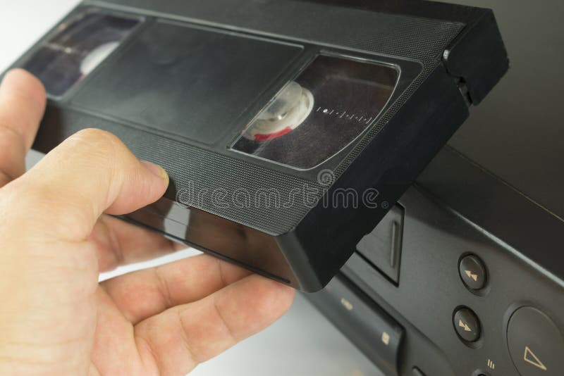 Cinta De Vídeo De VHS a Disposición Al Lado Del VCR Imagen de archivo -  Imagen de jugador, primer: 112914319