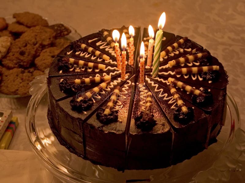 An available light shot of a rich dark chocolate birthday cake. An available light shot of a rich dark chocolate birthday cake.