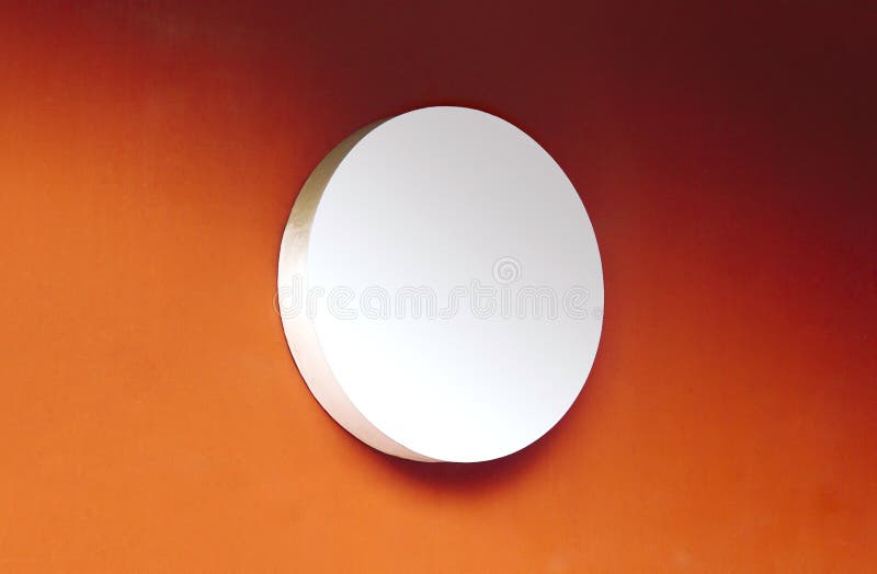 Circle empty signboard on orange background stock photo Circle empty signboard on orange background stock photo