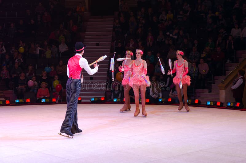 GOMEL, BELARUS - APRIL 10, 2015: Moscow Circus on Ice on tour. Performance of jugglers group. GOMEL, BELARUS - APRIL 10, 2015: Moscow Circus on Ice on tour. Performance of jugglers group