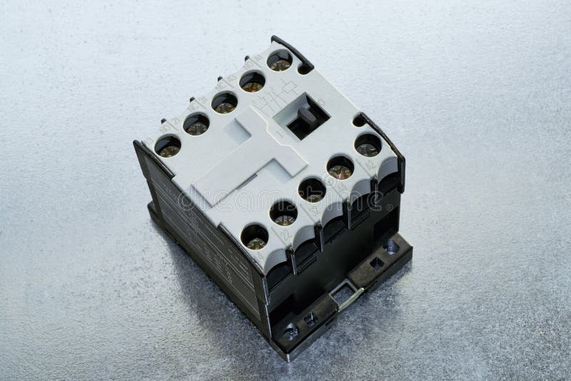 On the circuit board is a modern electrical contractor or minicontactors. royalty free stock photos