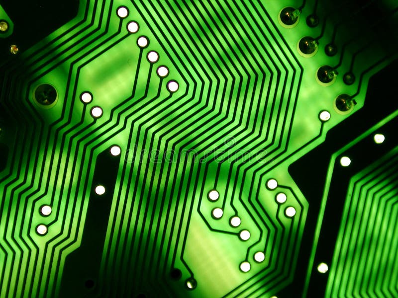 Abstract perspective on computer parts in glowing green and black patterns ideal as background or texture. Abstract perspective on computer parts in glowing green and black patterns ideal as background or texture