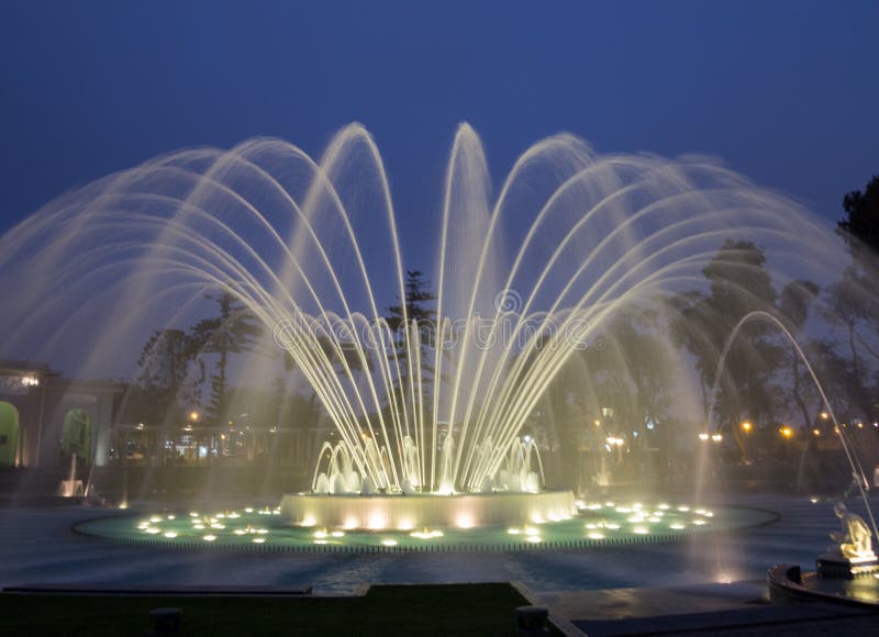 Illuminated fountains at dusk in Magical Water Circuit in Reserve Park, Lima, Peru world record for largest fountains. Illuminated fountains at dusk in Magical Water Circuit in Reserve Park, Lima, Peru world record for largest fountains