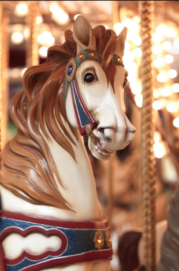 Circular horse carousel close up