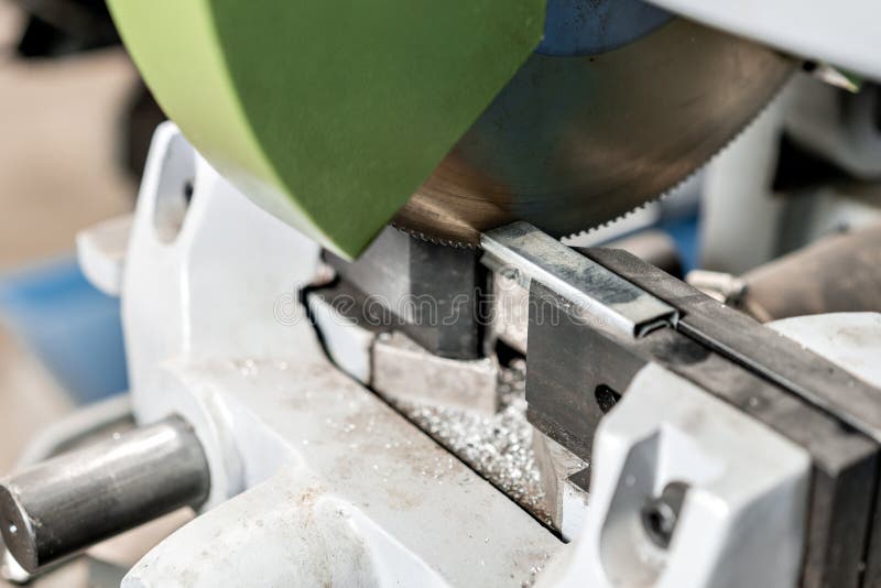 Circular Saw Machine. Cutting a Metal and Steel with with Sharp, Circular Blade in