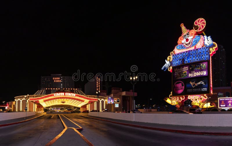 A picture of the Circus Circus Hotel and Casino, and its billboard, at night. A picture of the Circus Circus Hotel and Casino, and its billboard, at night