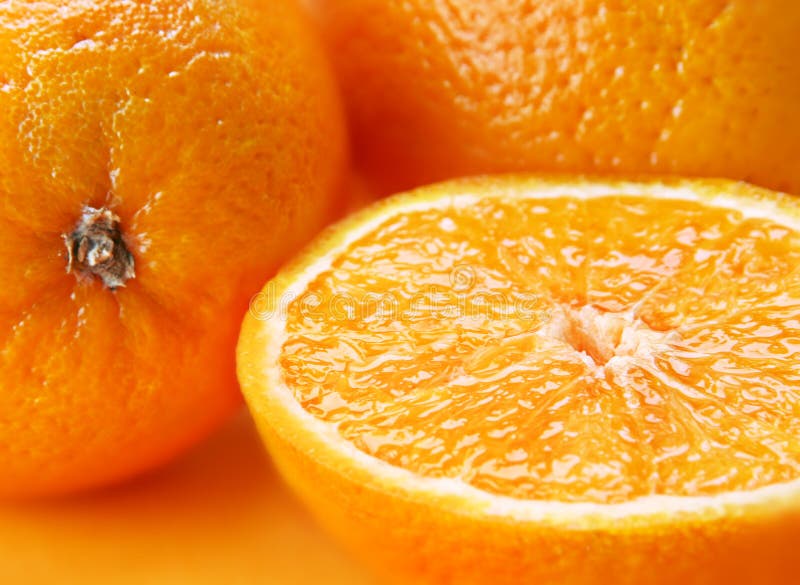 Citrus fruit orange with slice closeup