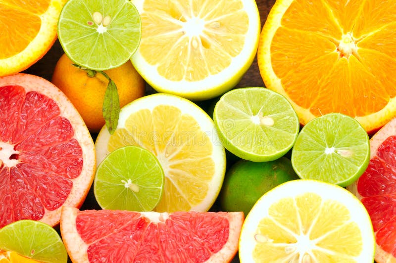 Citrus fruits on the wooden plate