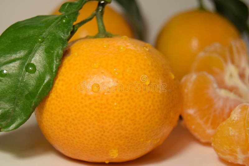 citrus orange Mandarin and Mandarin slices on white background close up.
