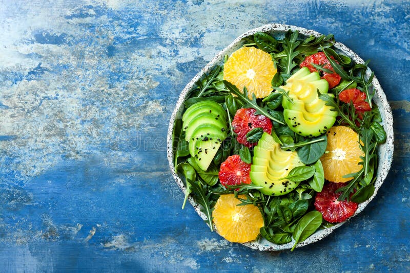 Citrus salad with mixed greens and blood orange. Vegan, vegetarian, clean eating, dieting, food concept. royalty free stock photo Citrus salad with mixed greens and blood orange. Vegan, vegetarian, clean eating, dieting, food concept. royalty free stock photo