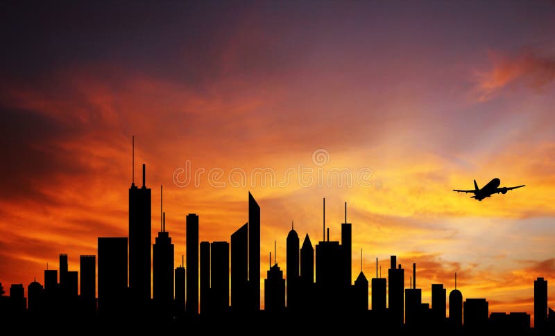 City downtown at dawn, skyline silhouette & plane