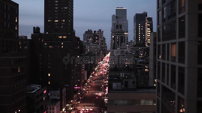 City at night skyline skyscraper nyc New York night lights aerial view flyover