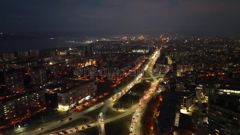 Aerial view of city at night. Street traffic of the city. Urban Landscape.