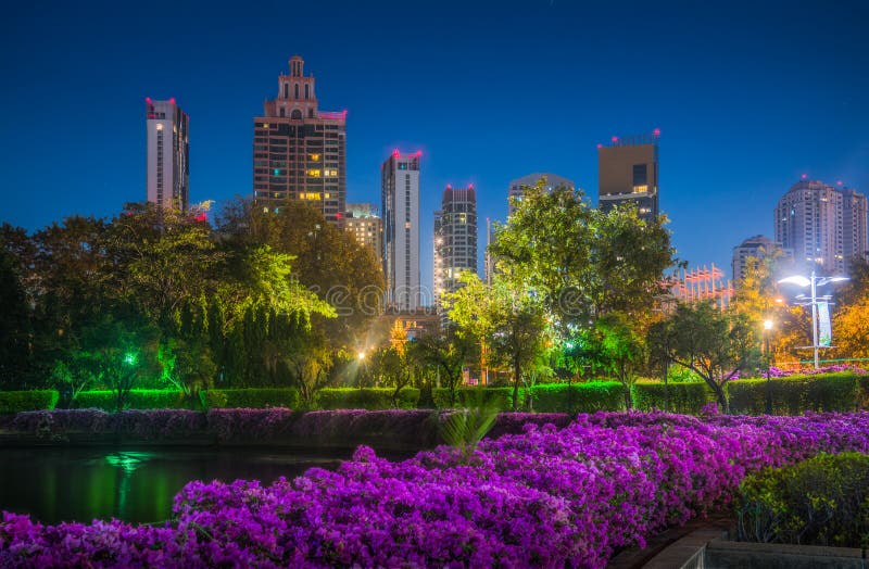 Skyscrapers Near South Part of Benjakiti Public Park at Night in Bangkok, Thailand. Skyscrapers Near South Part of Benjakiti Public Park at Night in Bangkok, Thailand