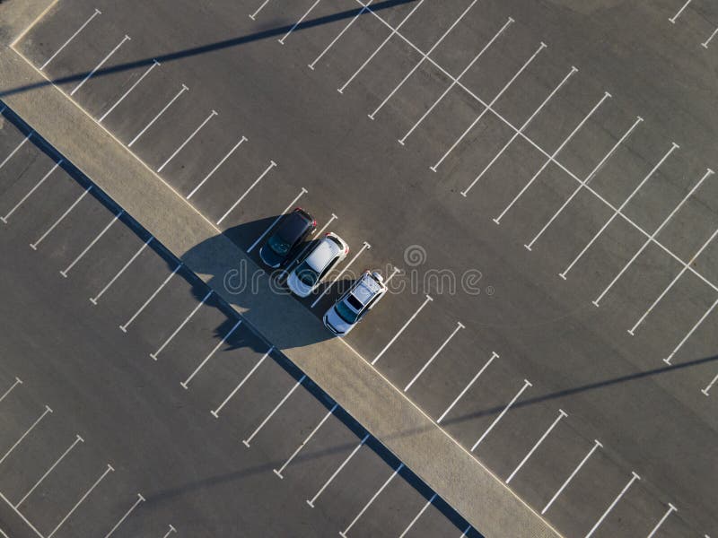 City parking with 3 Cars viewed from above, Top Aerial view